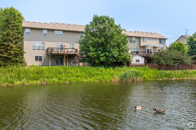 Many homes in Pinebrook Village feature backyards with scenic views along the shoreline.