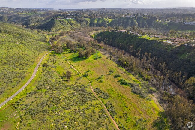 The Arroyo Preserve Rancho Santa Fe has wide open fields with rolling hills.
