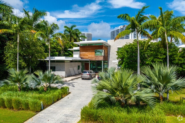 A modern eclectic single-family home in the heart of Golden Beach.