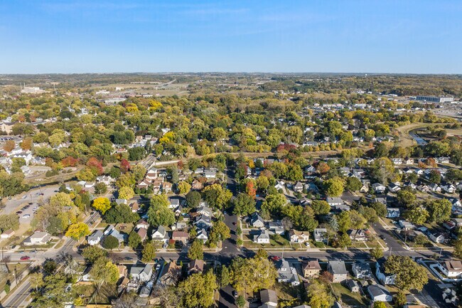 Aerial views of Slatterly Park showcase a vibrant community surrounded by green spaces.