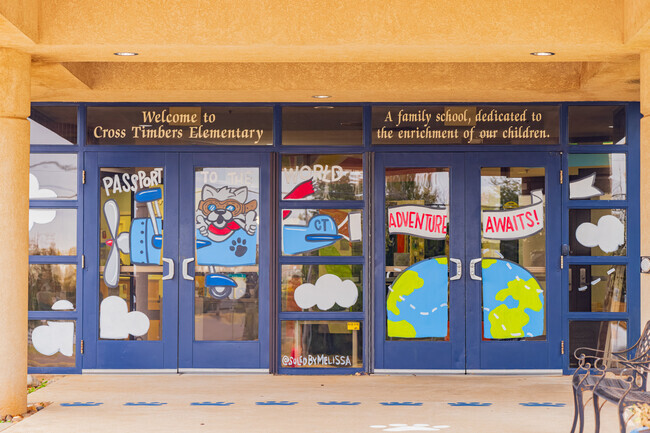 The entrance of Cross Timbers Elementary School is decorated with cute figure.