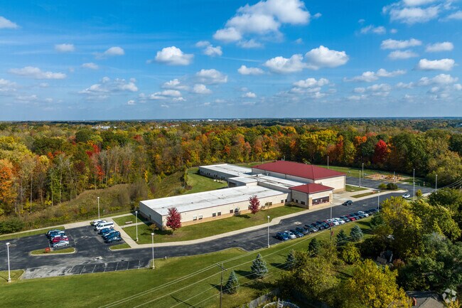 East Linden Elementary in Bridgeview is surrounded by densely packed trees.