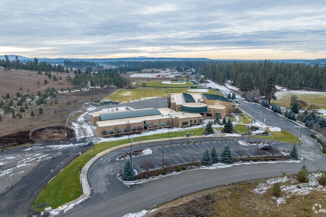 Northwest Christian Schools features a large outdoor area behind the lower campus.