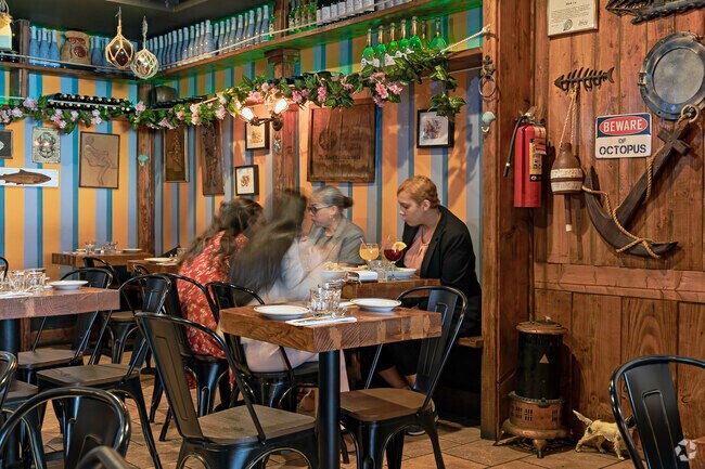 Residents of the Morrisania neighborhood enjoying an amazing lunch with friends at Porto Salvo.