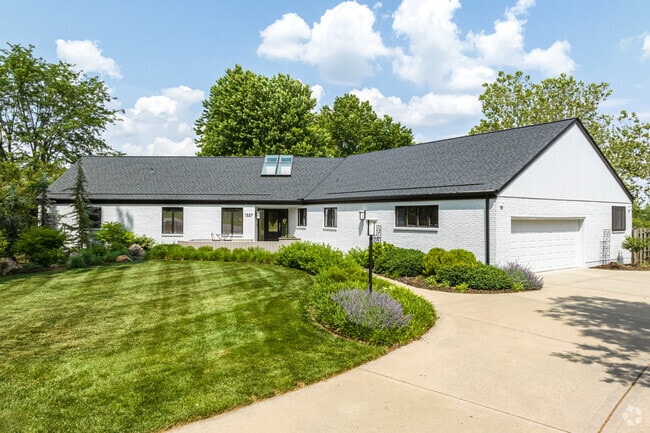Modern style one-story homes are speckled throughout the Blue Springs area.