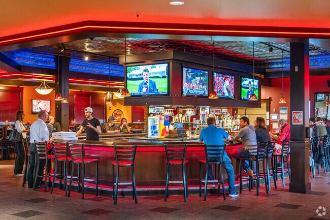 The Village at the Green Shopping Center houses Jupiter's At The Crossing.