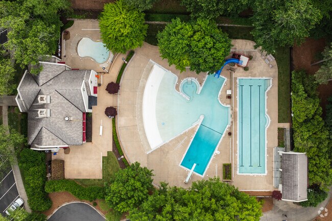 Huntcliff offers exclusive access to the Cherokee Town and Country Club’s pool, where members can relax and socialize in a refined setting surrounded by golf course views.