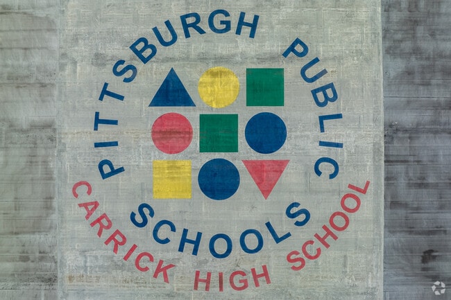 The Rooftop Signage for Carrick High School