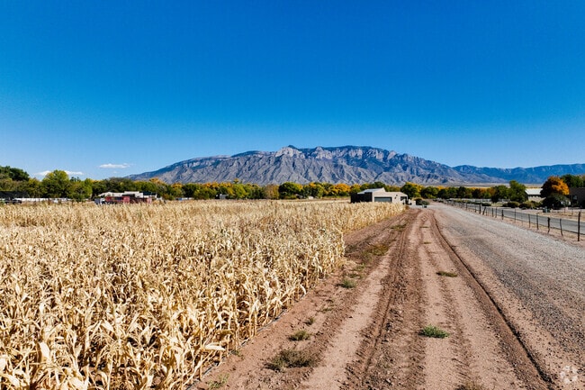The farm land and beautiful views in Corrales make it a great place to lay down roots.