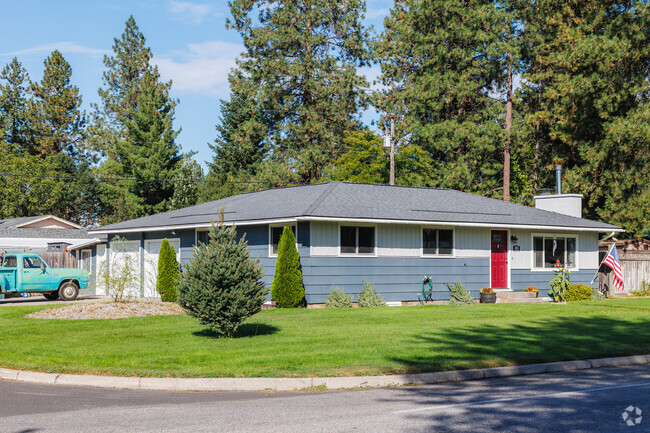 Opt for a quaint traditional ranch style home in Central Post Falls.