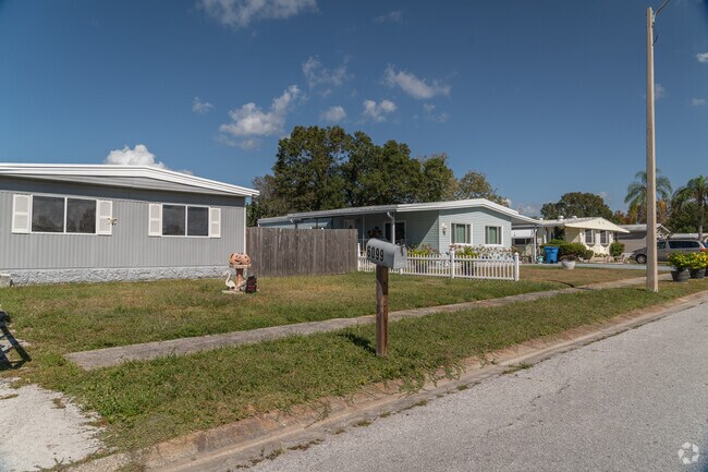Manufactured homes in South Highpoint are spotted near the commercial real estate district.