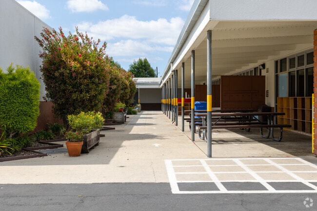 Madison Elementary School in Redondo Beach, CA has outdoor seating and a community garden.