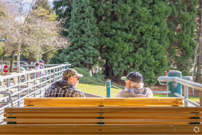 Catch up with an old friend on one of the beautiful benches at Gene Coulon Park near Kennydale.