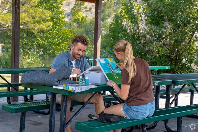 A couple paints at Canyon Entrance Park near Adams.