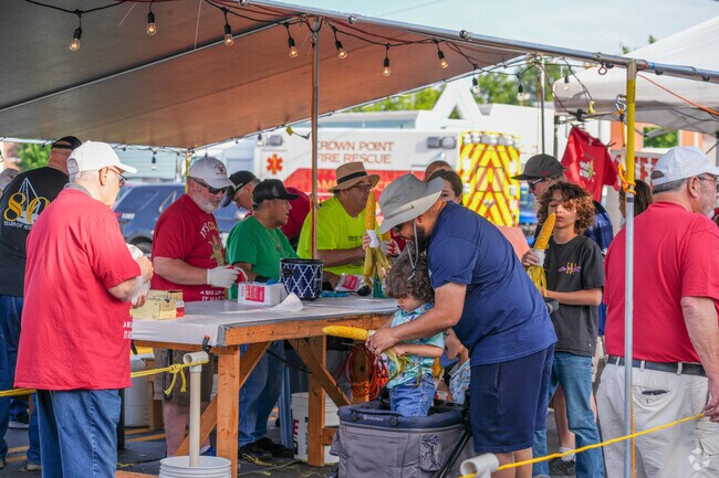 Grab corn on the cob at the Corn Roast Festival in Crown Point.