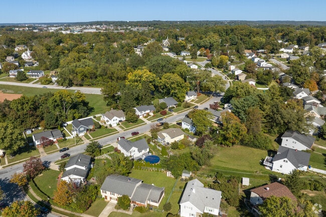 Tree-lined streets in Lutherville showcase large, well-kept family homes.
