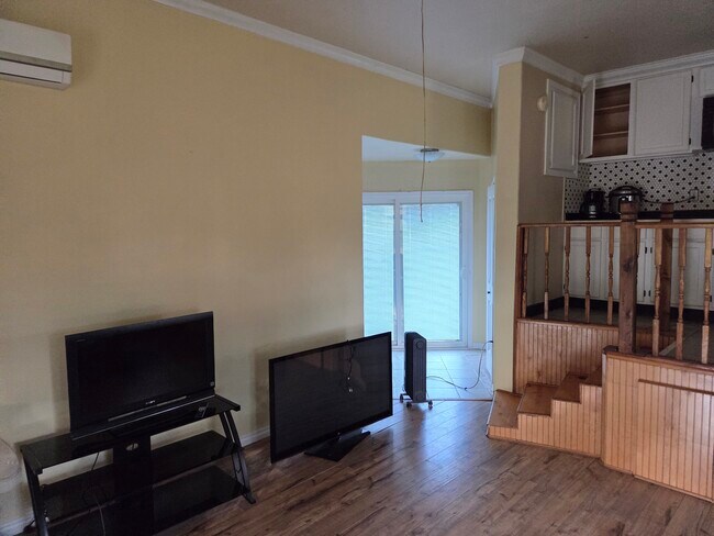 Kitchen is up the small flight of stairs