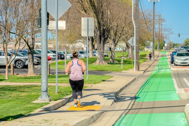 People jog and walk the safe streets of Lincoln Village.