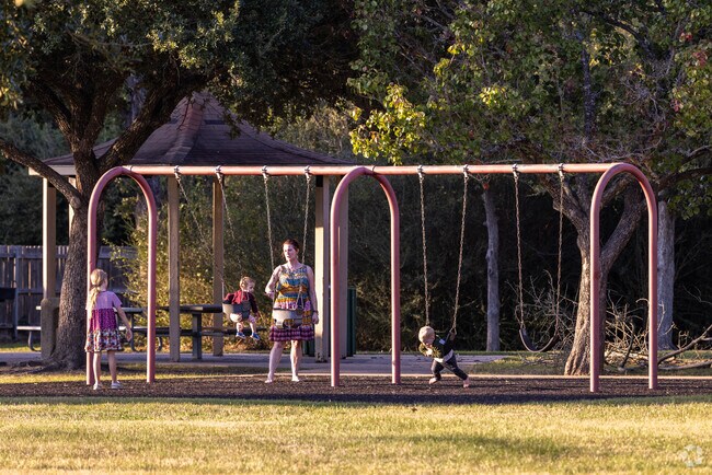 Central College Station residents enjoy the green space and playground at Brother Pond Park.