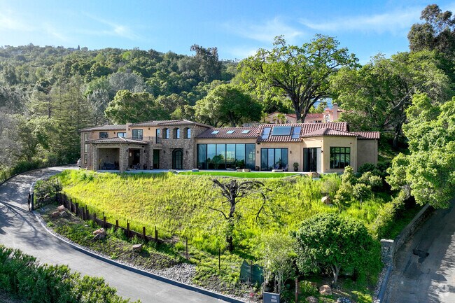 Many postmodern-style homes sit upon hills in East Los Gatos.