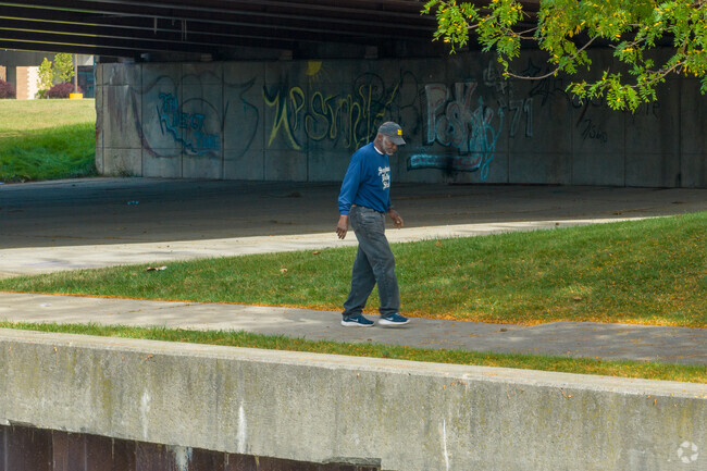 Locals enjoy the quiet solitude of Riverfront Saginaw.