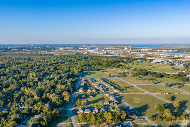 Owens' homes stretch out on the rapidly developing landscape of Mobile, AL.