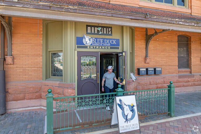 The Blue Duck Barbecue Tavern features house-smoked BBQ, craft beers, cocktails, and whisky.