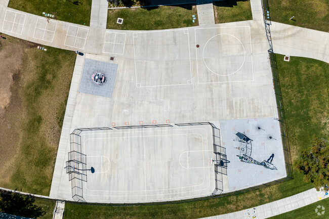 A large cement pad provides space for various outdoor activities at New Bridge School.