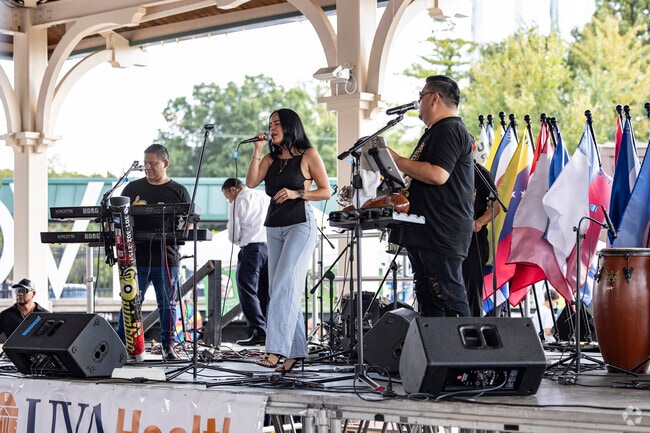 Live bands perform upbeat music for the Manassas Latino Festival in Old Town Manassas.