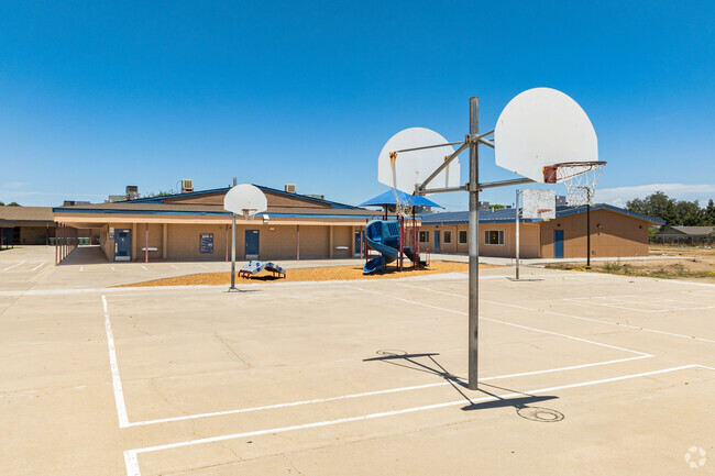 Pleasant Elementary School students can play a game of basketball on one of their recesses.