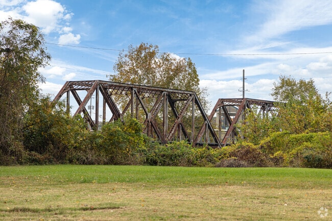 This railway bridge crosses the Mermec River to Buder North Park.