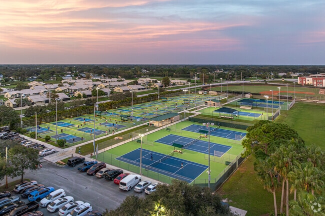 Whispering Pines Park offers many well-lit tennis and pickle ball courts.