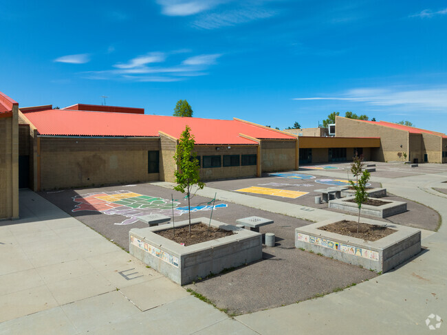 Paved play areas are available during recess for Amesse Elementary students.