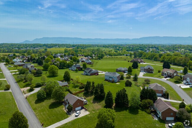 Sevier Home subdivisions with Bays Mountain in the background.