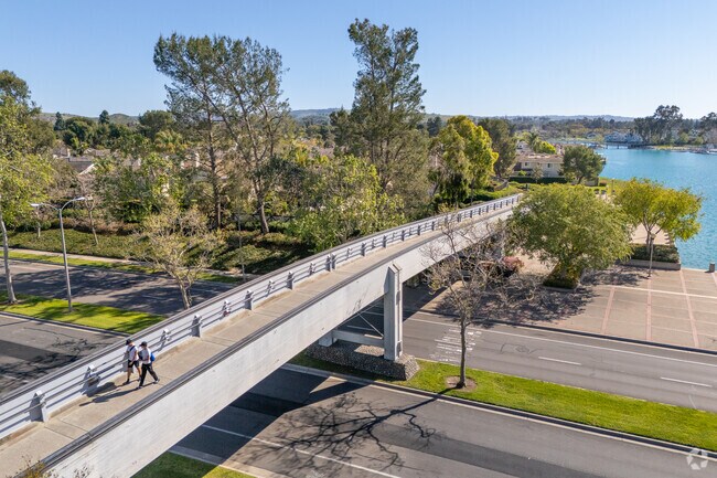 The bridge connecting residents by allowing access to walk or ride around Woodbridge safely.
