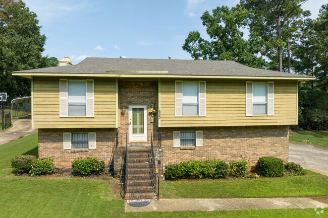 Enjoy Smithfield Estates in this raised-ranch style house.