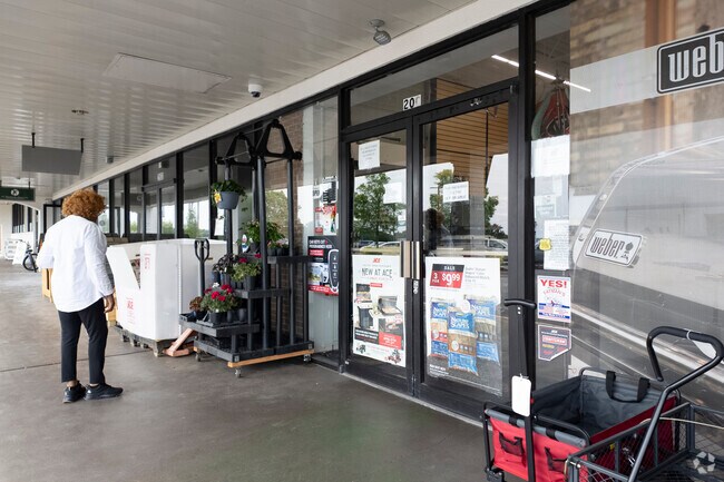 Ace Hardware welcomes visitors with sidewalk specials.