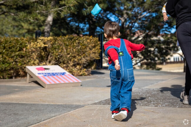Play a game of bean bag toss at Bradley Fair in Crestview Heights.