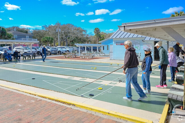 Grab some friends and head to the shuffleboard courts along Flagler Avenue in Central Beach.