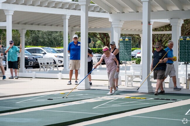 Village of Glenbrook locals enjoy a game of shuffleboard at Saddlebrook Recreation Center.