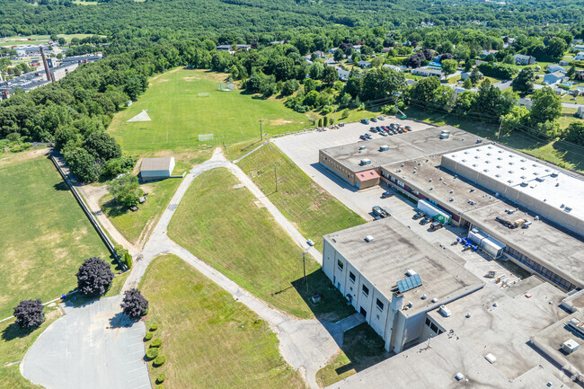 West Warwick High School students enjoy a large field area for recreation.