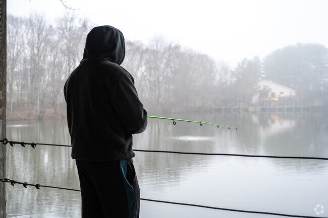 Go fishing on a foggy day in Glenwood at Warfields Pond Park.