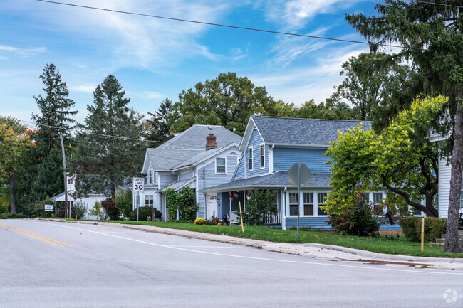 There is a row of beautiful historic homes along Main Street in the Old Mill Creek neighborhood.