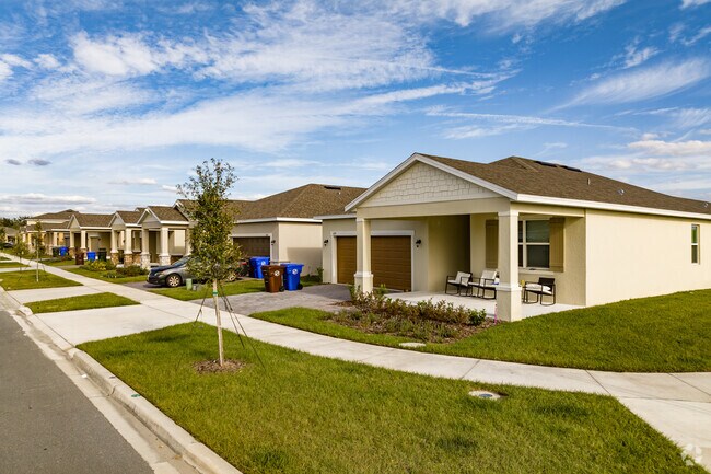 A row of new construction homes in Osceola Village Center in Lake Toho.