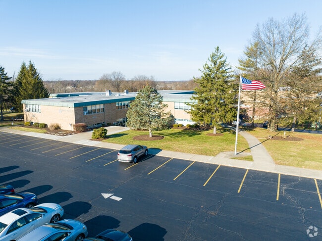 The John Paul II Catholic School has many entrances and exits around the building.