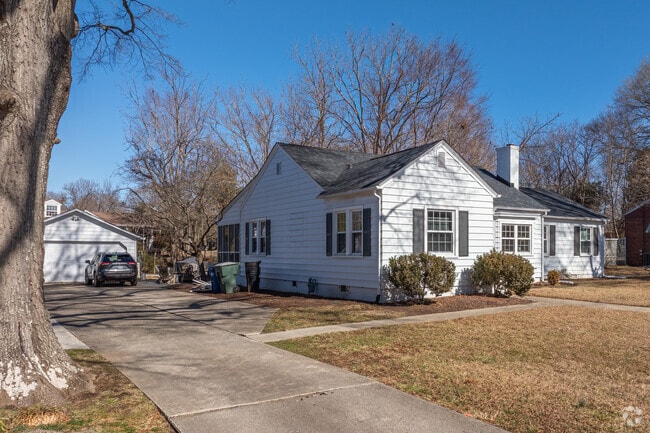 In Graham, a cottage-style home is situated on a spacious lot.