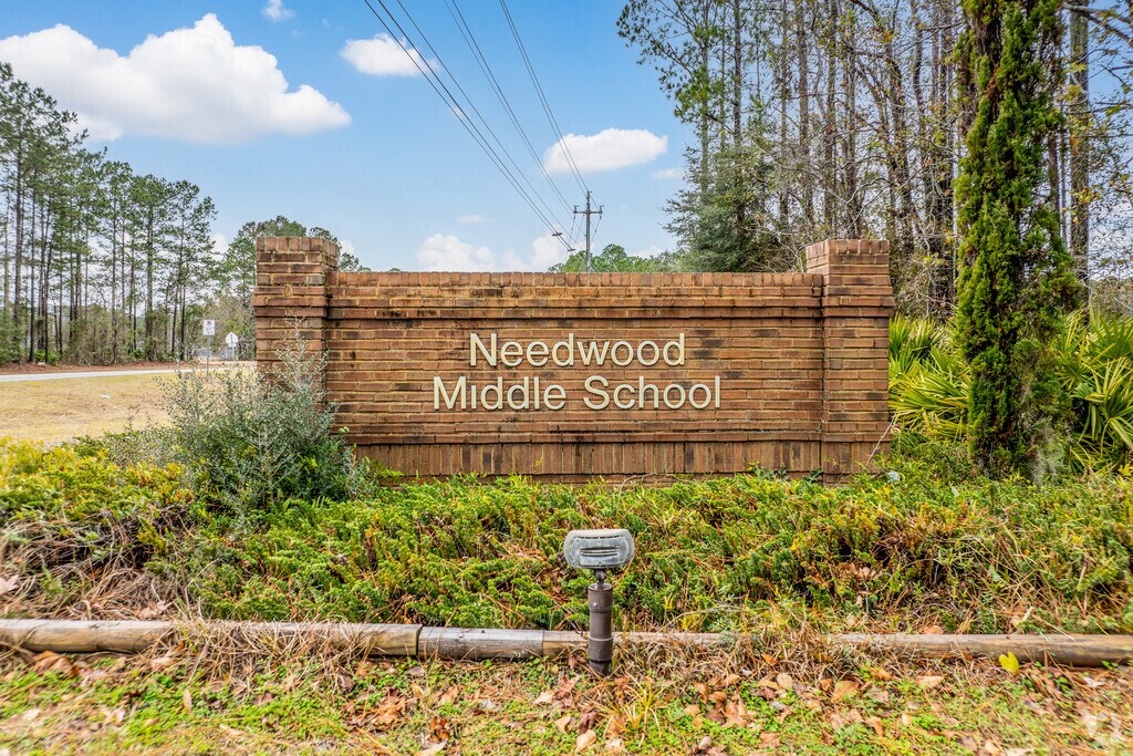 Needwood Middle School offers strong academics near the Country Club Estates community.