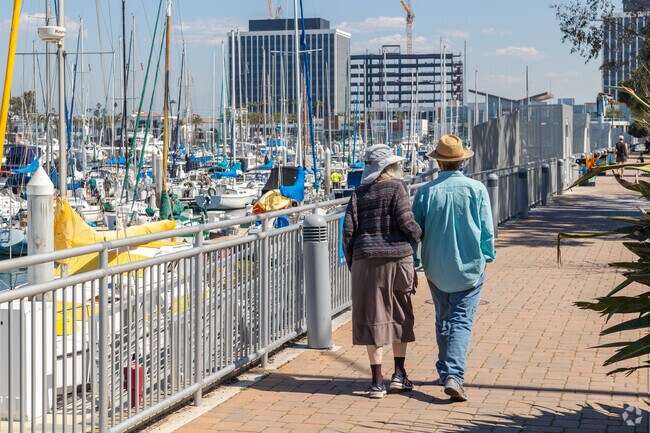 Residents can enjoy a walk in the sun around the harbor in Marina Del Rey.