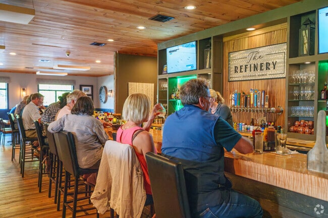 Grab a seat at the bar and enjoy a cold drink at The Refinery in Andover.