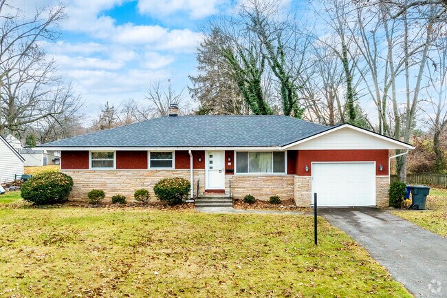 A ranch home in Maize-Morse features an attached one-car garage.